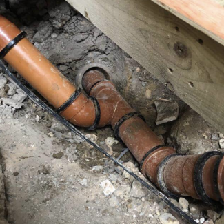 Excavation to replace damaged underground drainage pipes