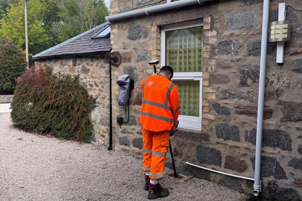 GPS survey equipment recording property levels during a flooding investigation