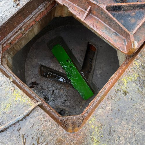 Dye testing to check drainage flow routes and pipe connections