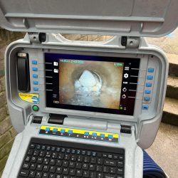 CCTV drain survey image showing a collapsed pipe