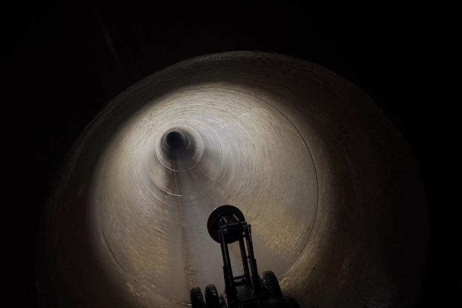 Site photograph documenting drainage inspection works before construction