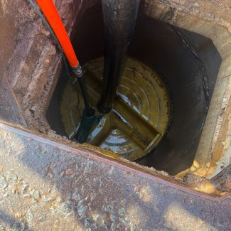 Jet-vac cleaning of a surface-water drainage line