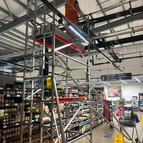Scaffolding providing access to high-level drainage pipework for cleaning