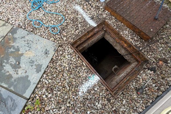 Photograph from a residential drainage survey before a property extension